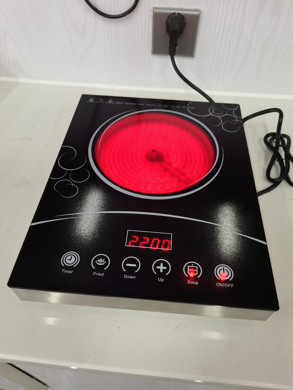 Induction cooktop push button