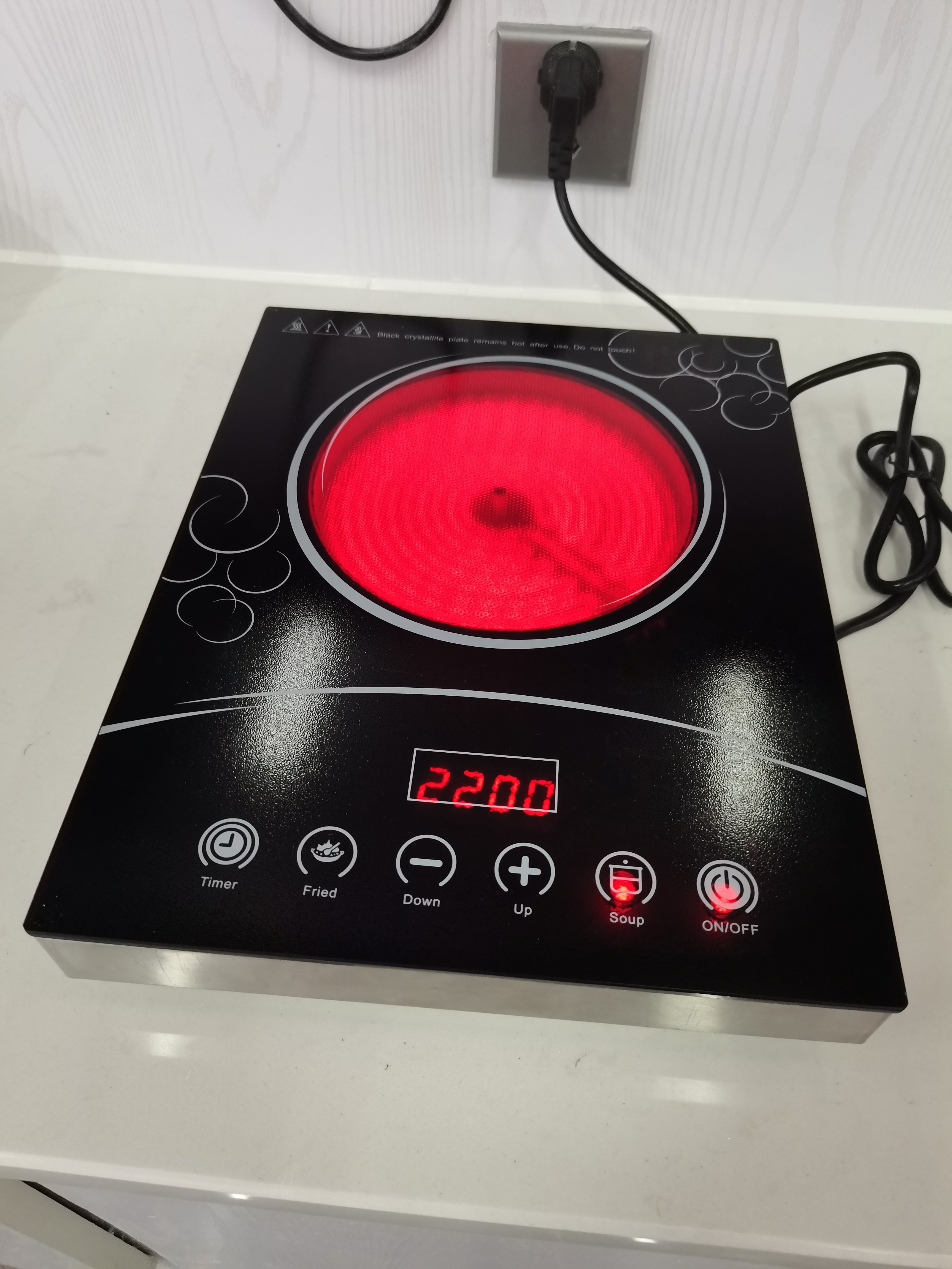 Induction cooktop push button